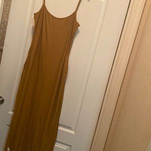 a mustard yellow body con dress
